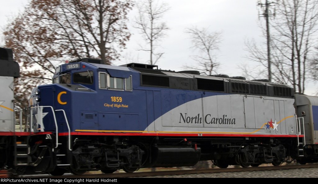 RNCX 1859 heads south on train 75